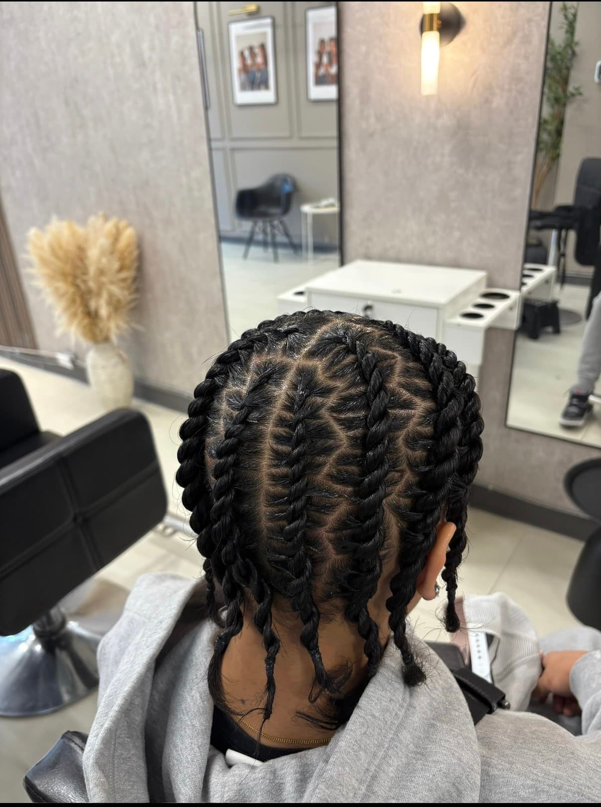 Twists posés vers l'arrière sur un client au studio Nattes, dans le Plateau à Montréal